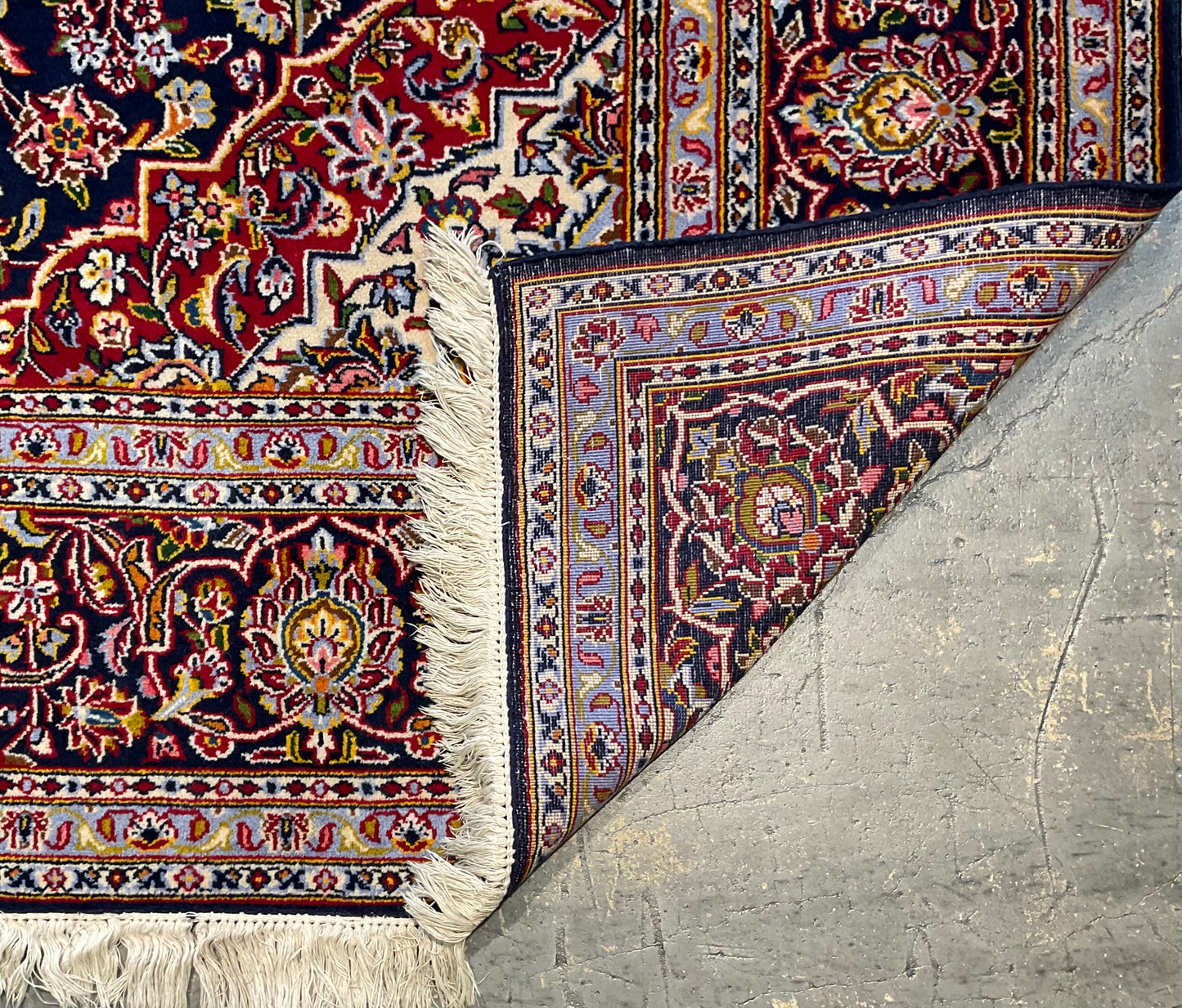 Antique Kashan rug features an unusual navy blue background | NU-2257