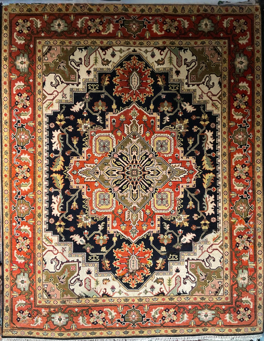 A striking Heriz design rug features a bold black and rust | 1690