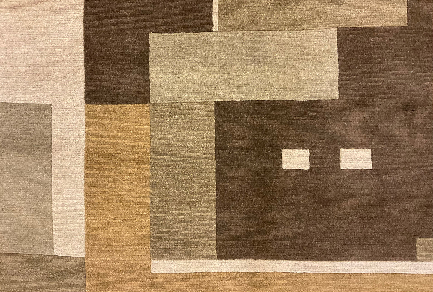 This contemporary geometric rug features a warm, earthy palette |1138