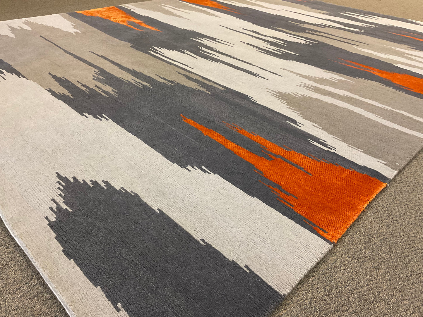 Stylish blend of grey and orange tones rug | NU-5097