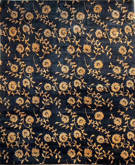 Floral design rug in a rich black and gold palette | NU-2557