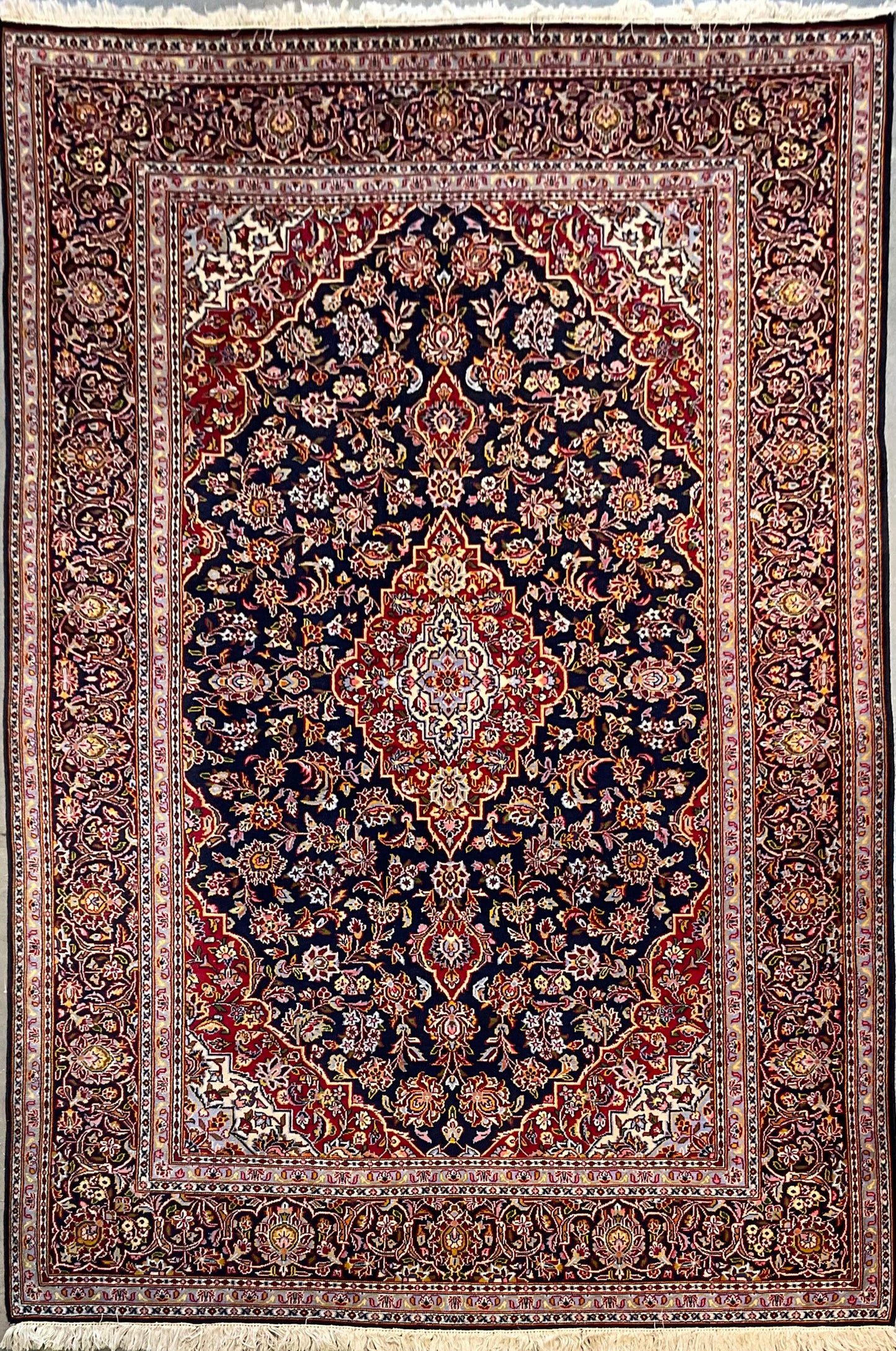 Antique Kashan rug features an unusual navy blue background | NU-2257