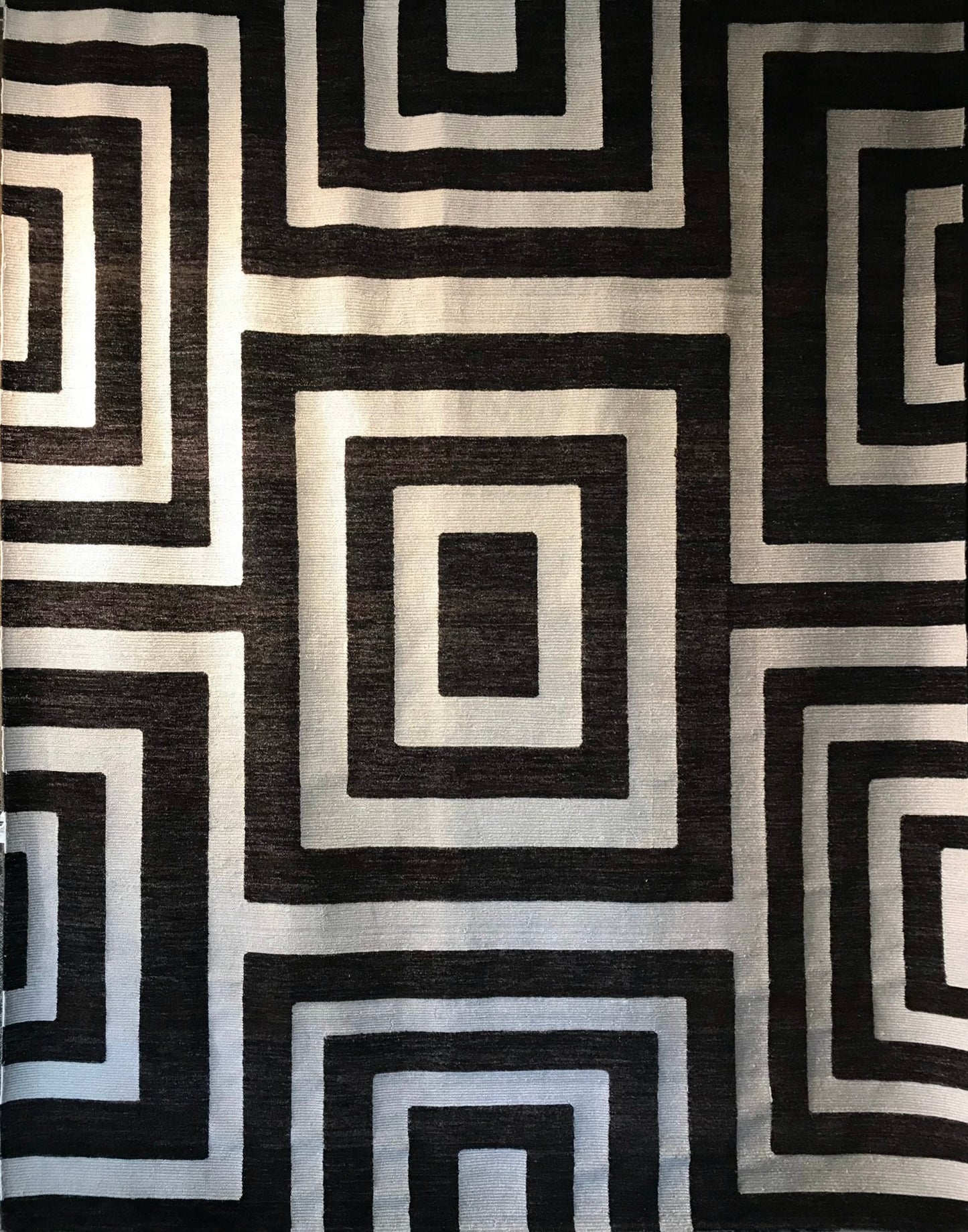 Ultra-modern rug features a deep black and charcoal | NU-2585