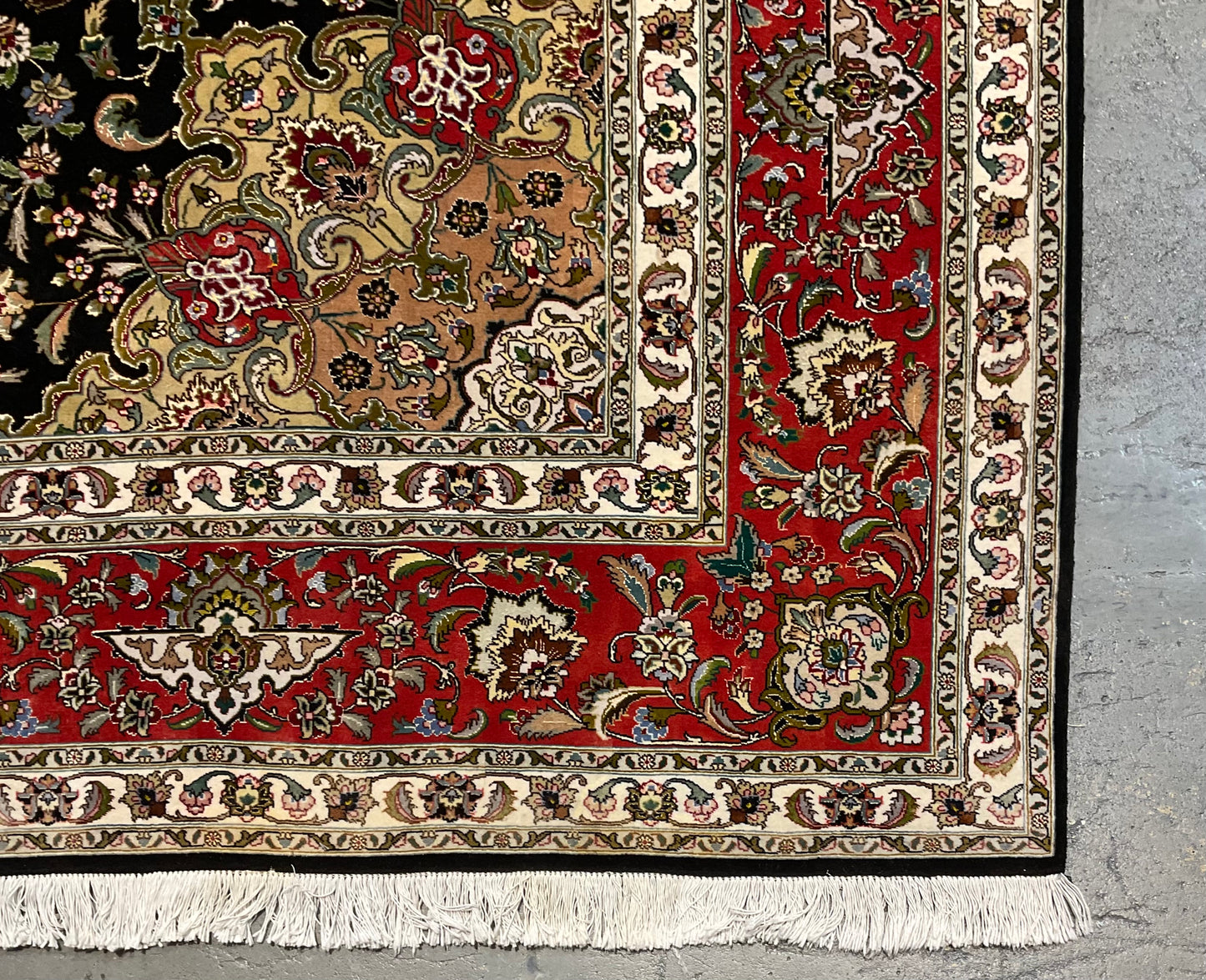 Floral Tabriz rug features a deep black background | NU-2387