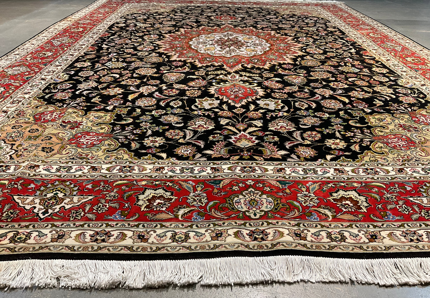 Floral Tabriz rug features a deep black background | NU-2387