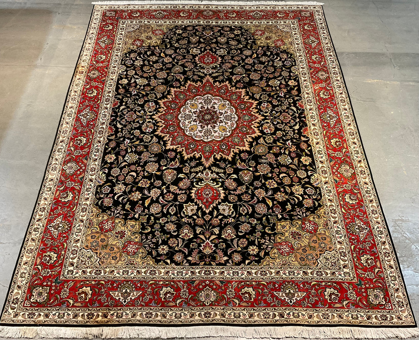 Floral Tabriz rug features a deep black background | NU-2387