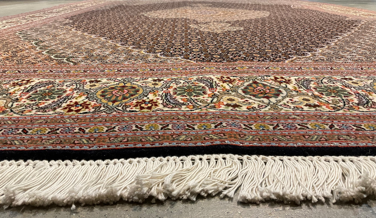 Mahi Tabriz rug features a deep black-brown field | NU-4780