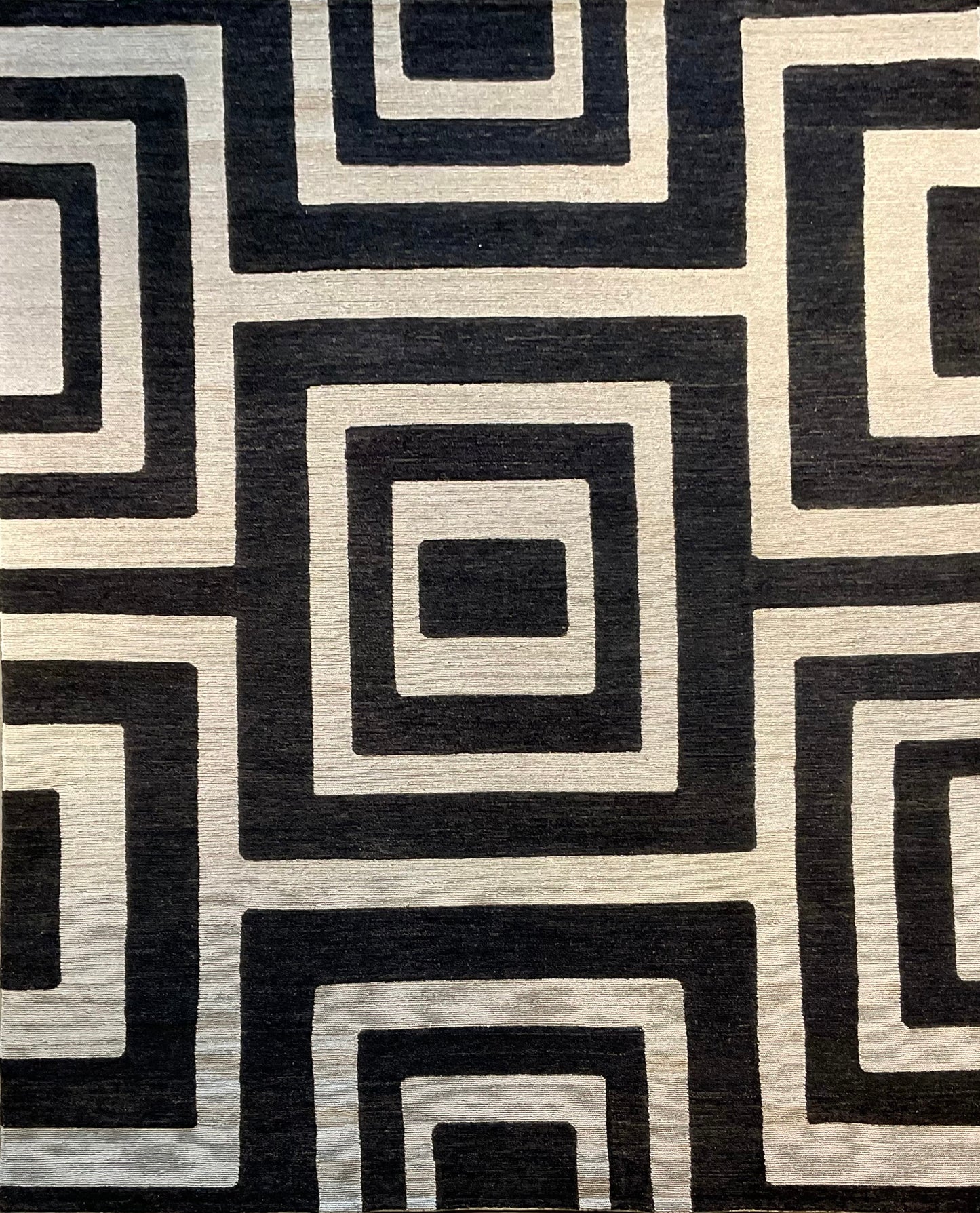 Ultra-modern rug features a deep black and charcoal | NU-2585