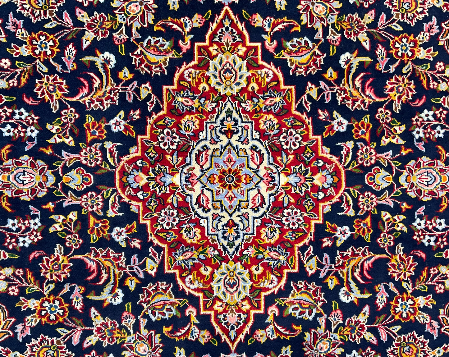 Antique Kashan rug features an unusual navy blue background | NU-2257