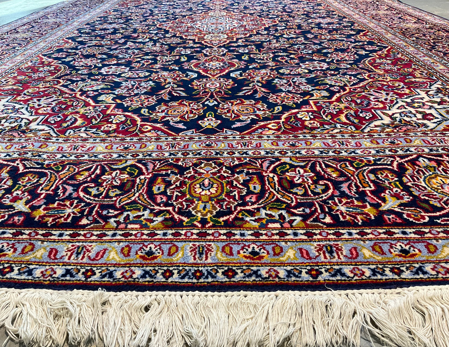 Antique Kashan rug features an unusual navy blue background | NU-2257