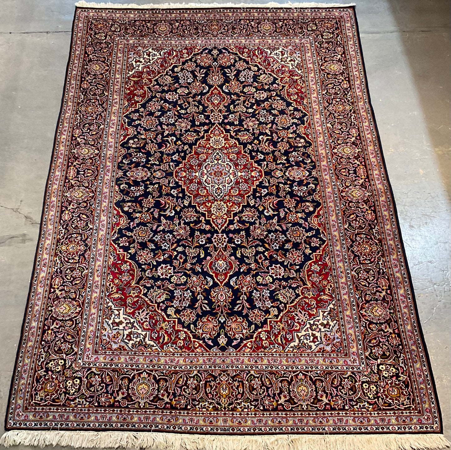 Antique Kashan rug features an unusual navy blue background | NU-2257