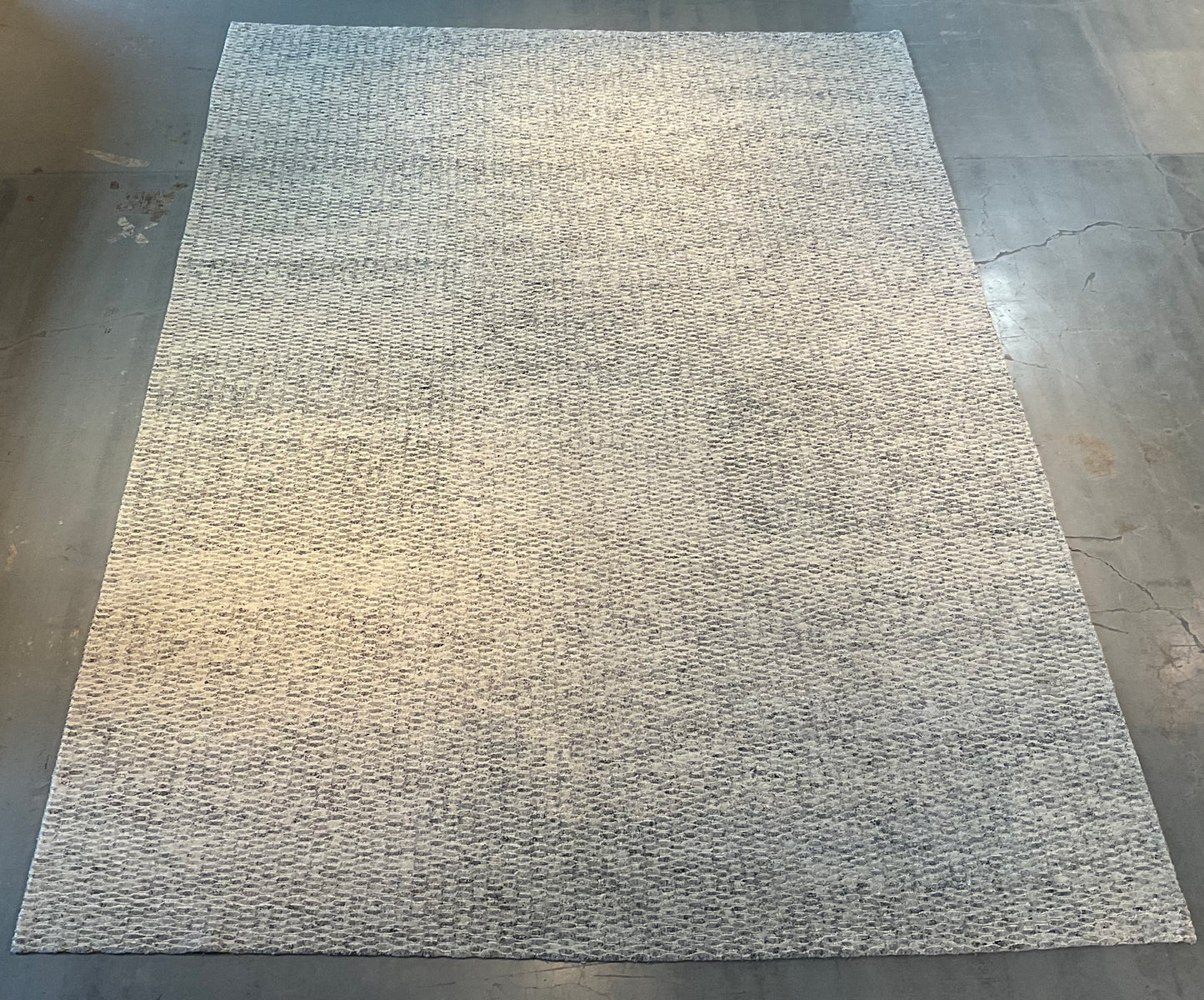 Textured rug features a subtle organic pattern, undyed wool | NU-4618