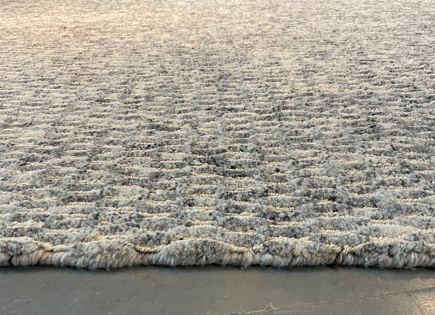 Textured rug features a subtle organic pattern, undyed wool | NU-4618